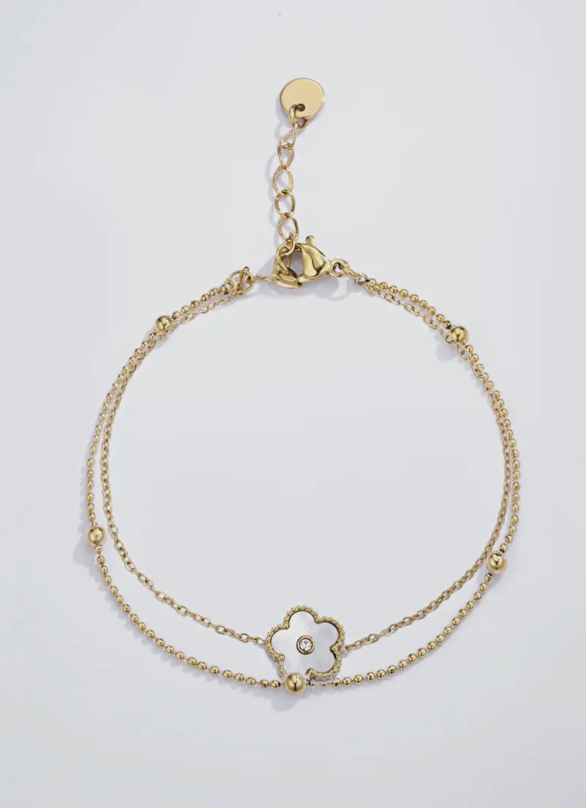 Amara – Edelstahl-Armband mit filigranem Blumenanhänger